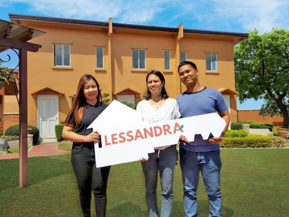 lessandra piling lucky winner house key awarding