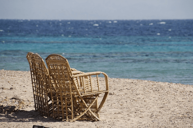 Brace for the breeze while sitting on your airy rattan seat.