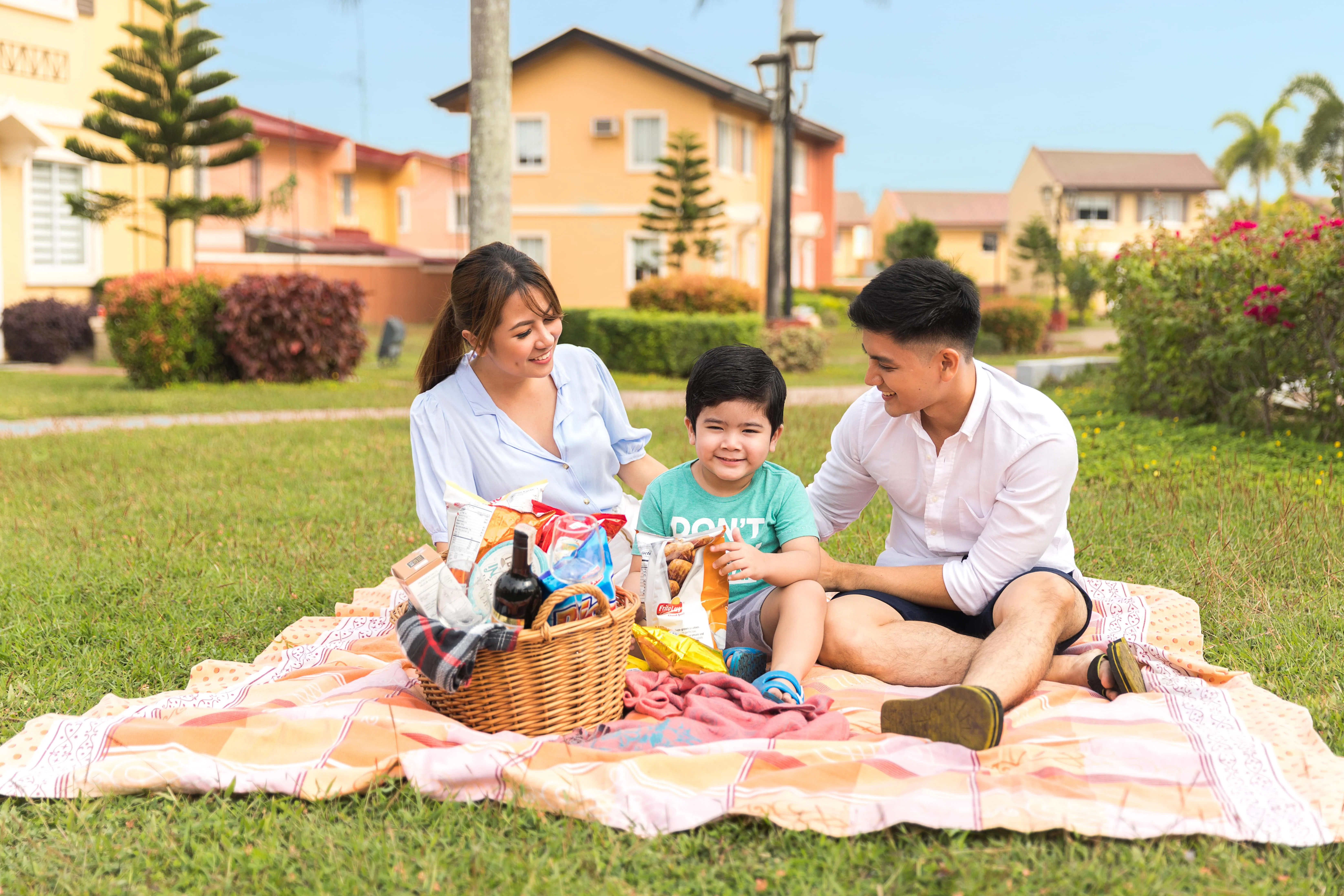 family having picnic in lessandra community